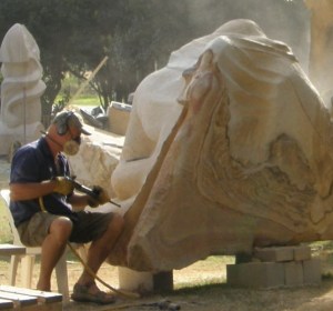 Artist Antone Bruinsma working sculpture